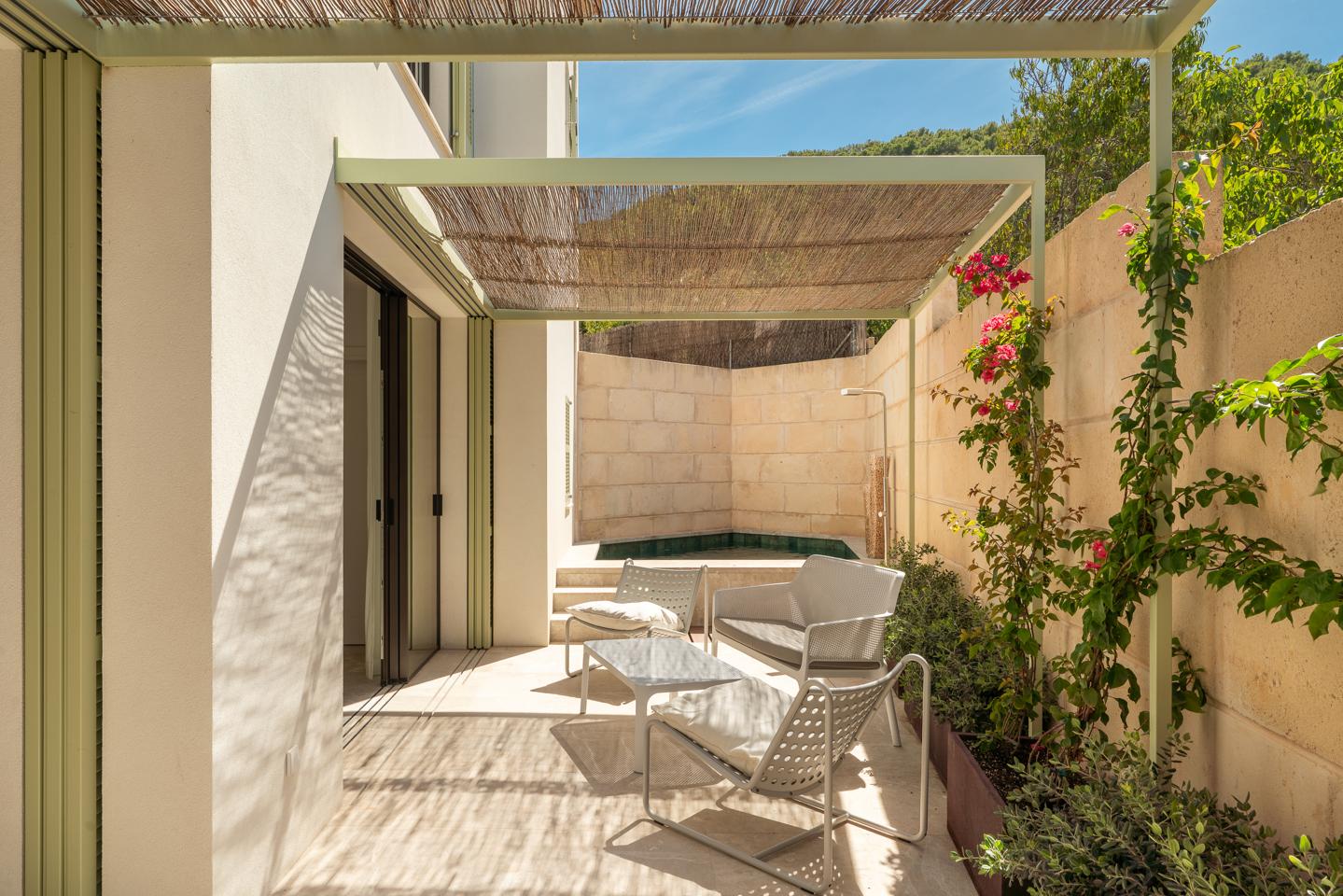 Casa de obra nueva con íntimo patio mediterráneo en S’Arracó — S'Arracó — Foto 7
