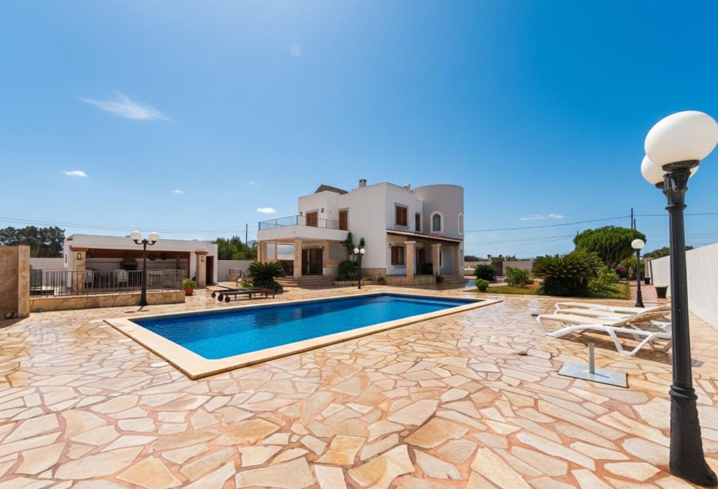 Villa with a swimming pool, garden and sea views in Cala de Bou